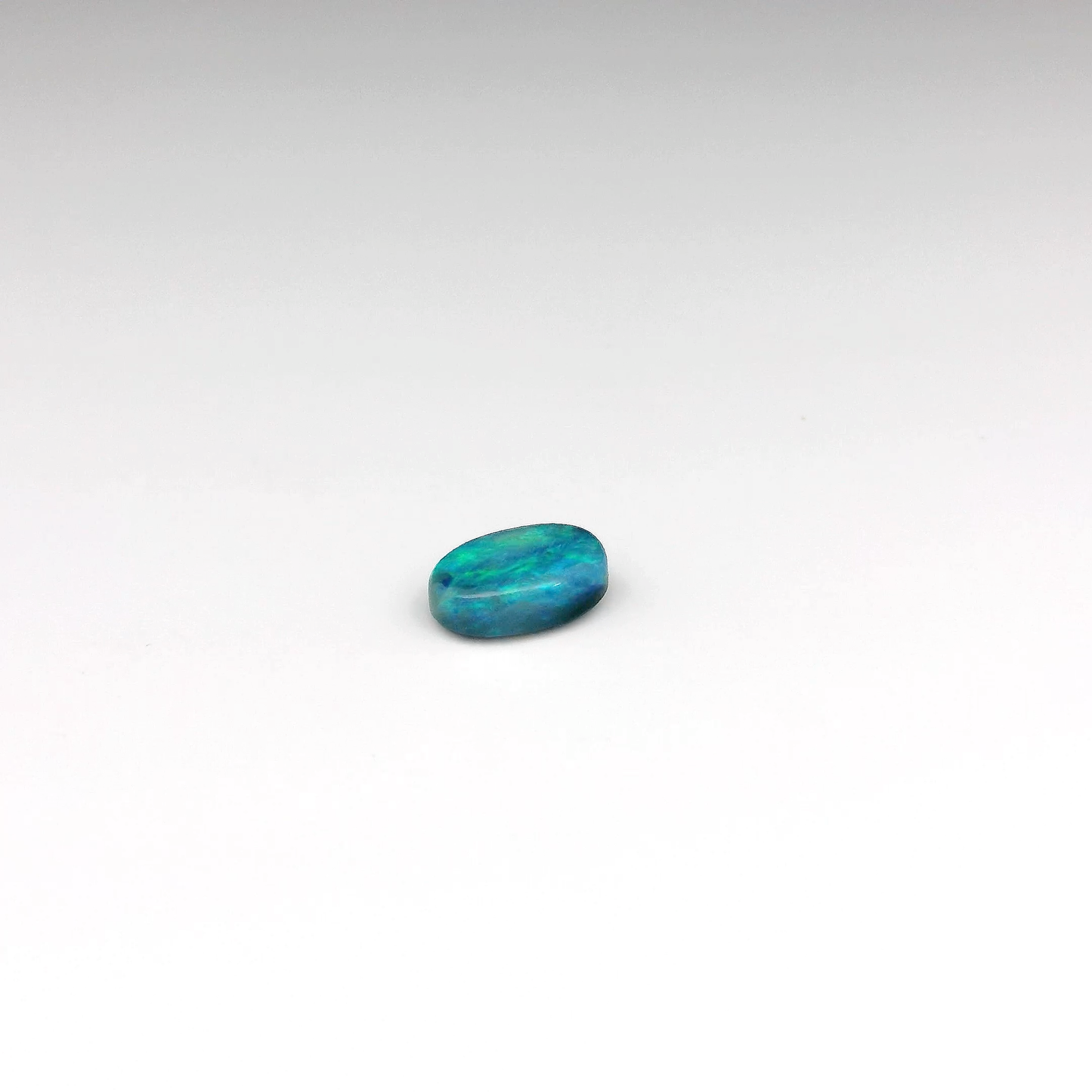 0.82ct Green, Blue Opal Gemstone