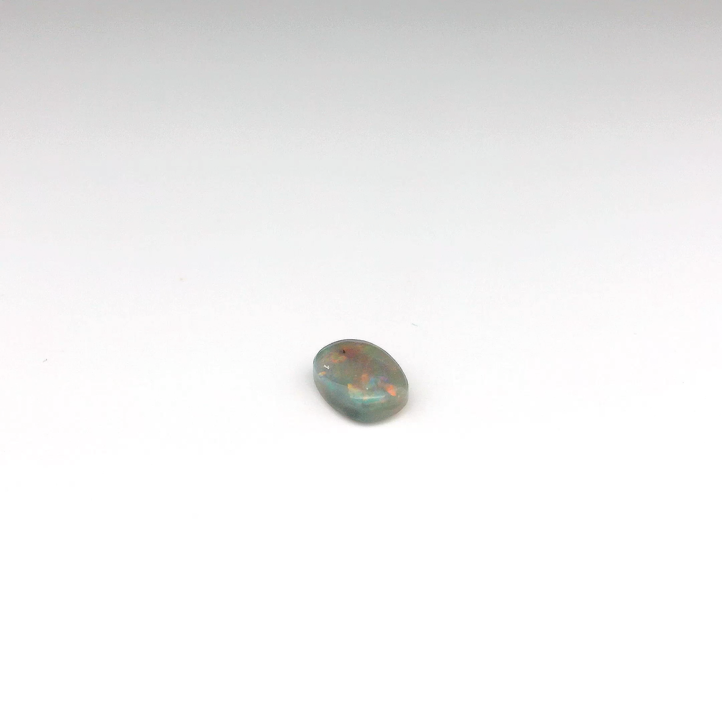 0.7ct Red, Multicolour Opal Gemstone