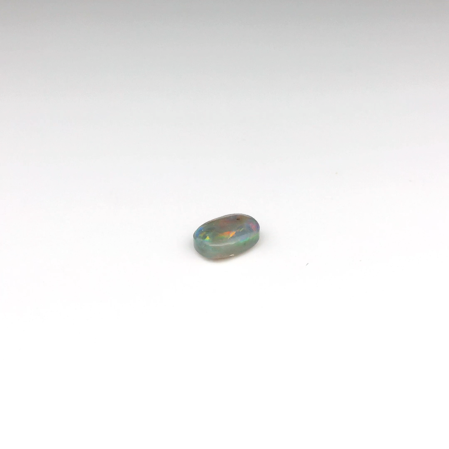 0.7ct Red, Multicolour Opal Gemstone