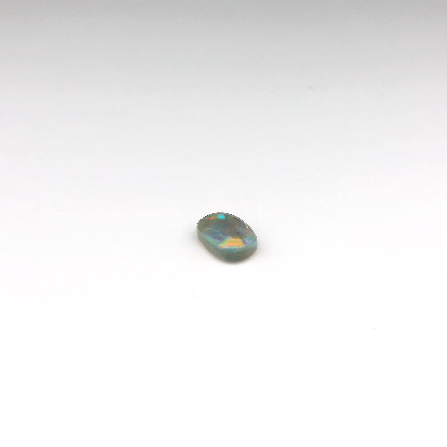 0.7ct Red, Multicolour Opal Gemstone