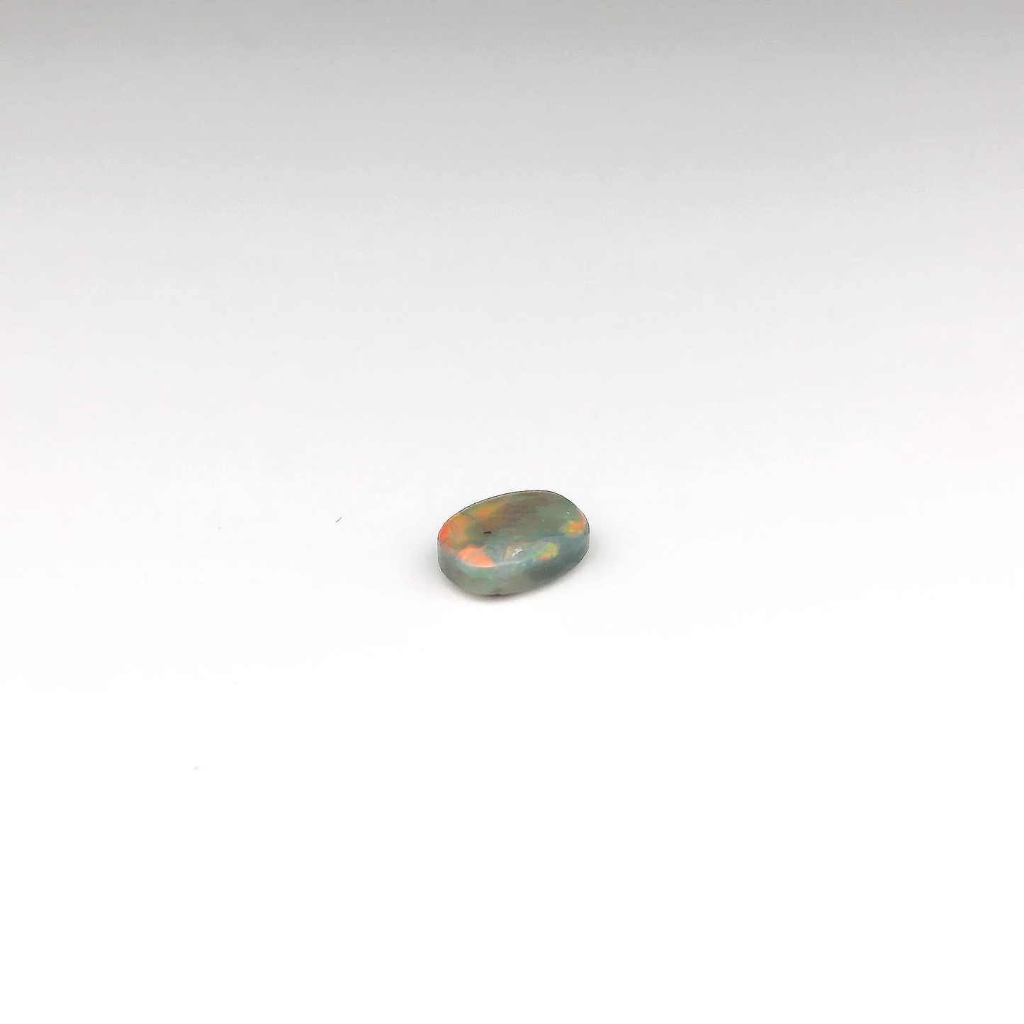 0.7ct Red, Multicolour Opal Gemstone
