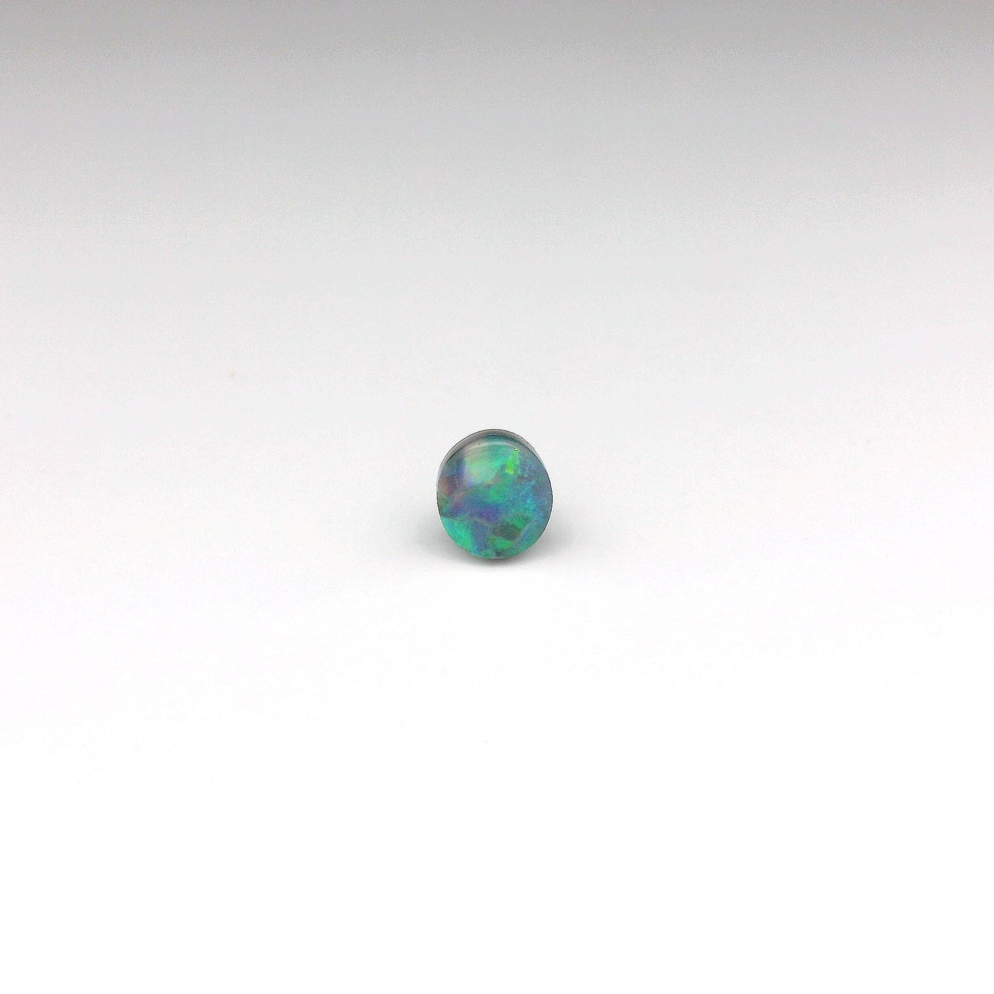 0.61ct Green, Orange Opal Gemstone