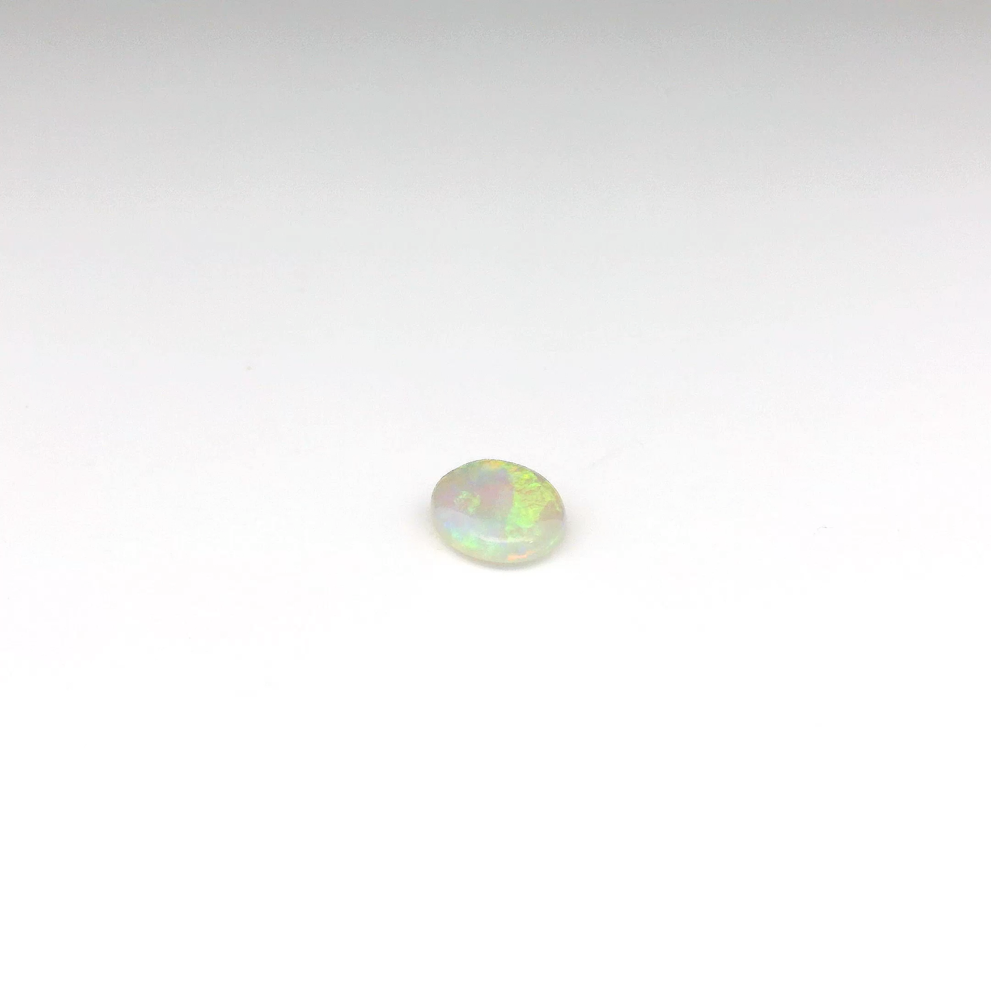 0.63ct Orange, Green Opal Gemstone