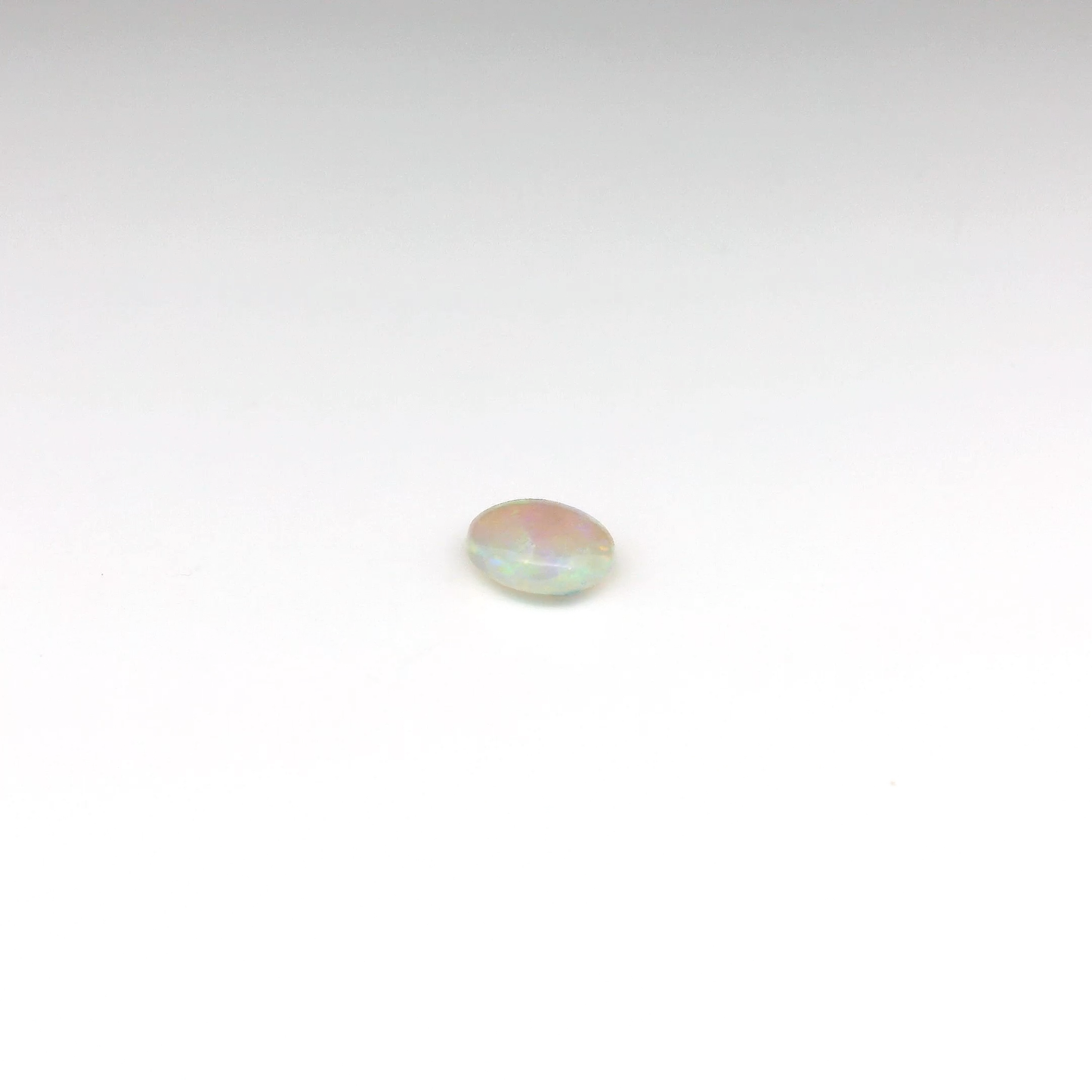 0.63ct Orange, Green Opal Gemstone
