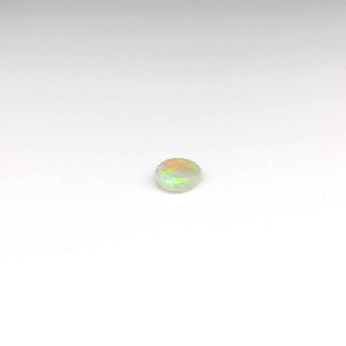 0.63ct Orange, Green Opal Gemstone