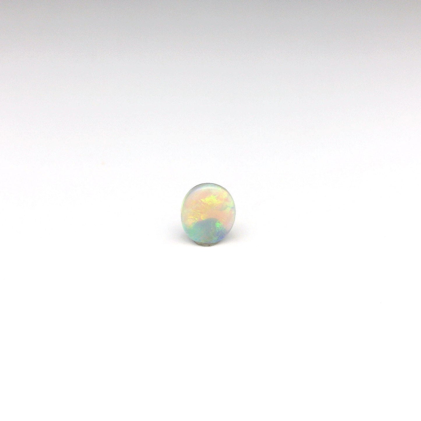 0.63ct Orange, Green Opal Gemstone