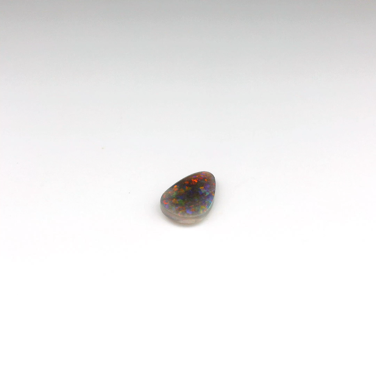 0.86ct Red, Orange Opal Gemstone