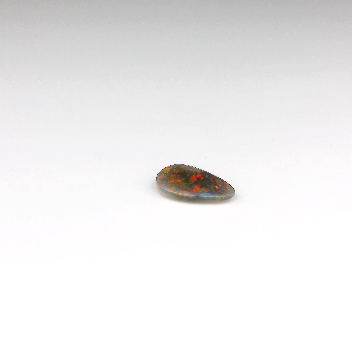 0.86ct Red, Orange Opal Gemstone