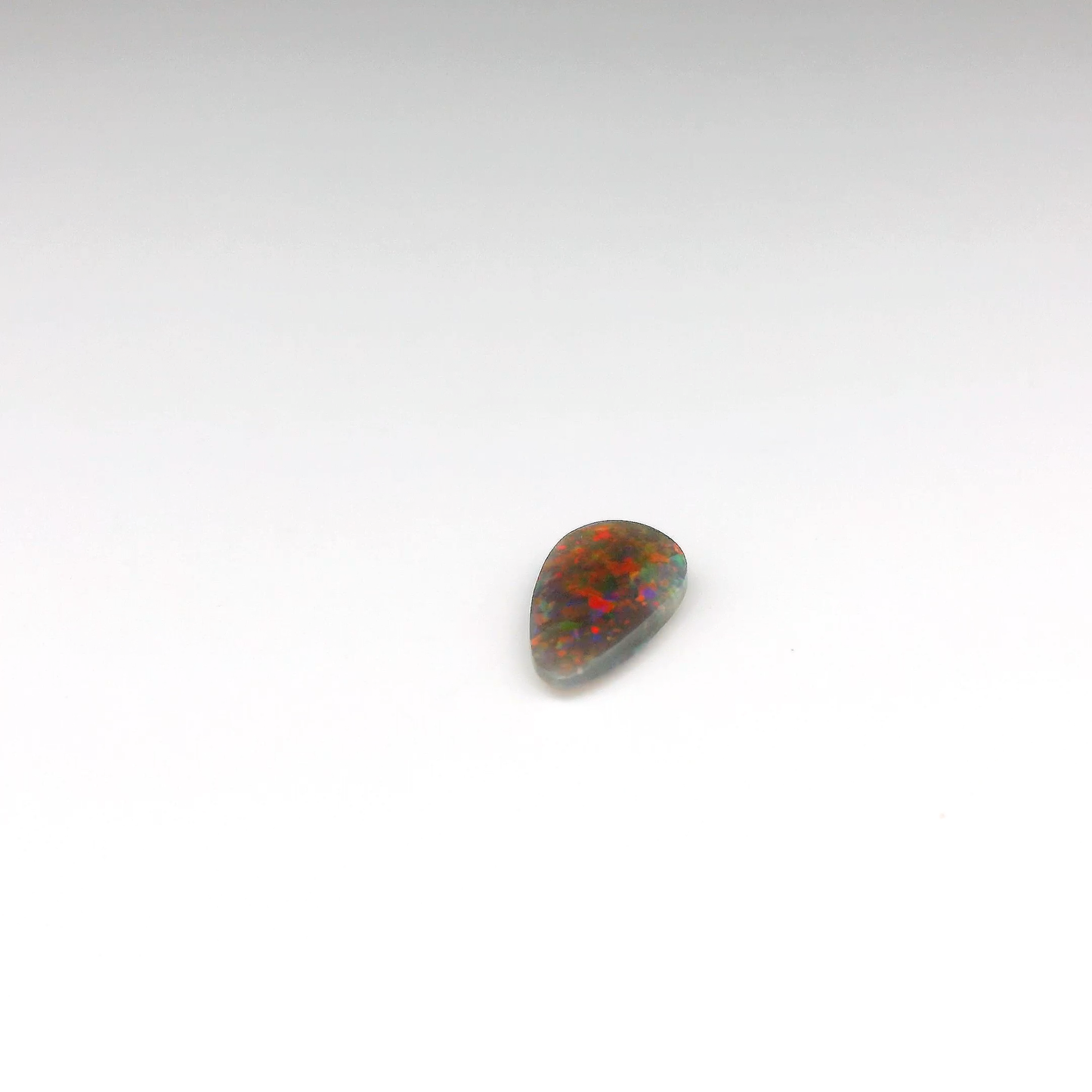 0.86ct Red, Orange Opal Gemstone