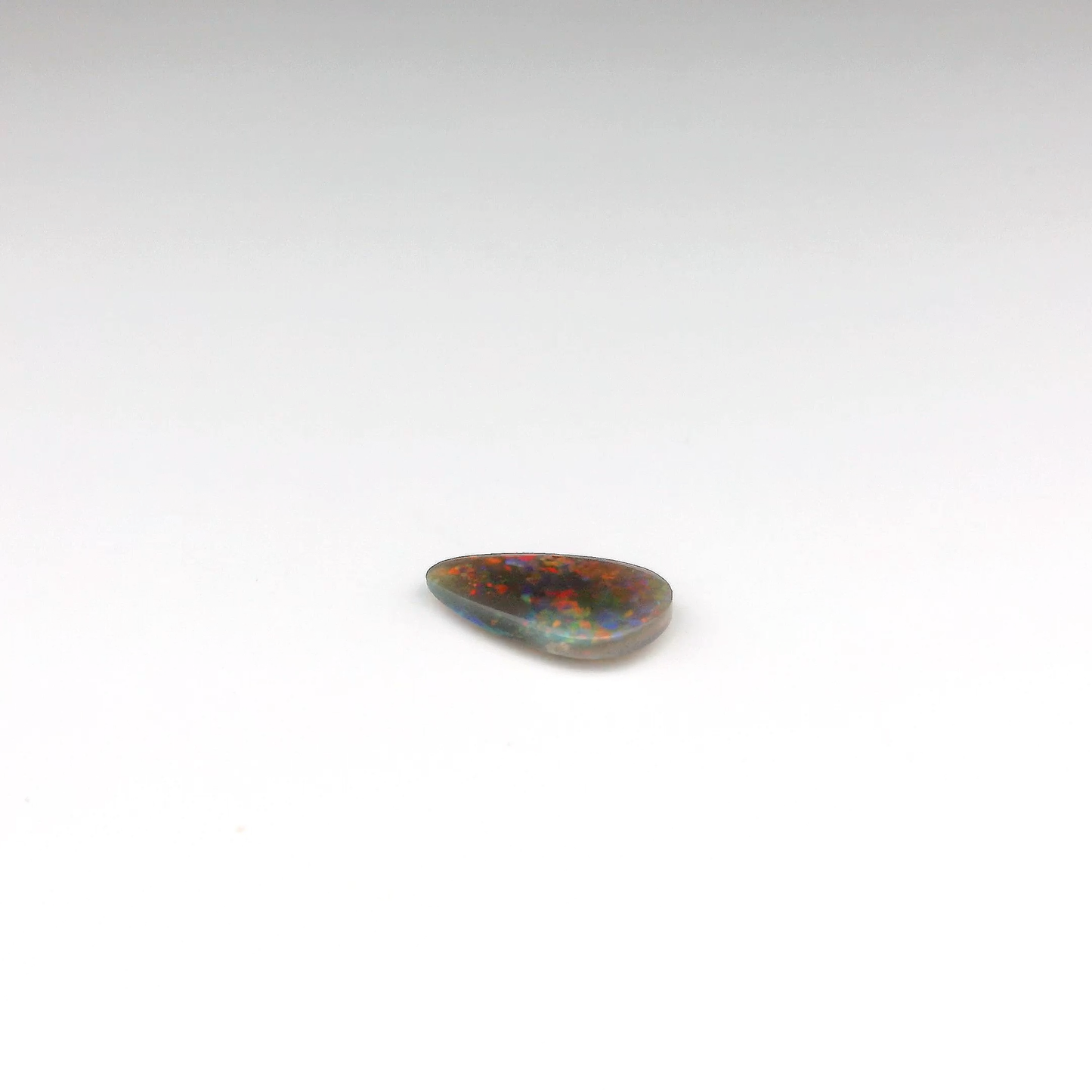 0.86ct Red, Orange Opal Gemstone