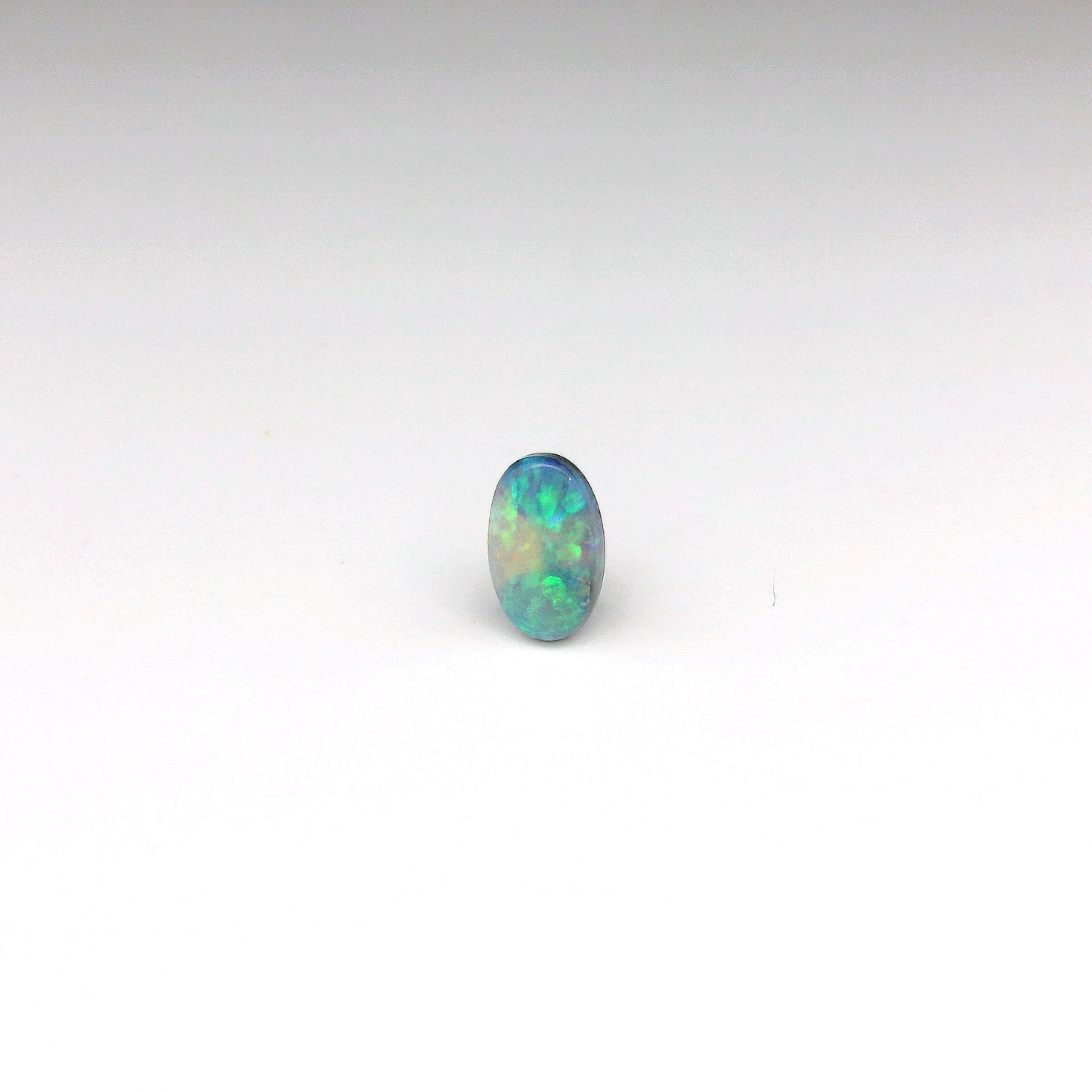 0.67ct Green, Blue Opal Gemstone