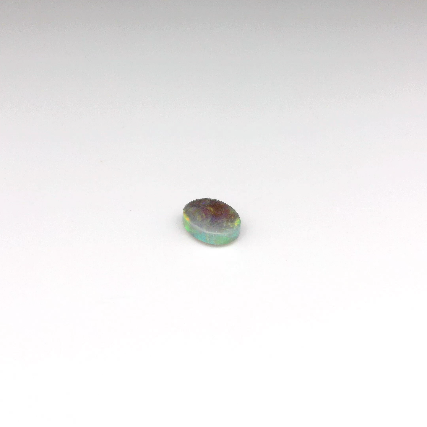 0.7ct Orange, Red Opal Gemstone