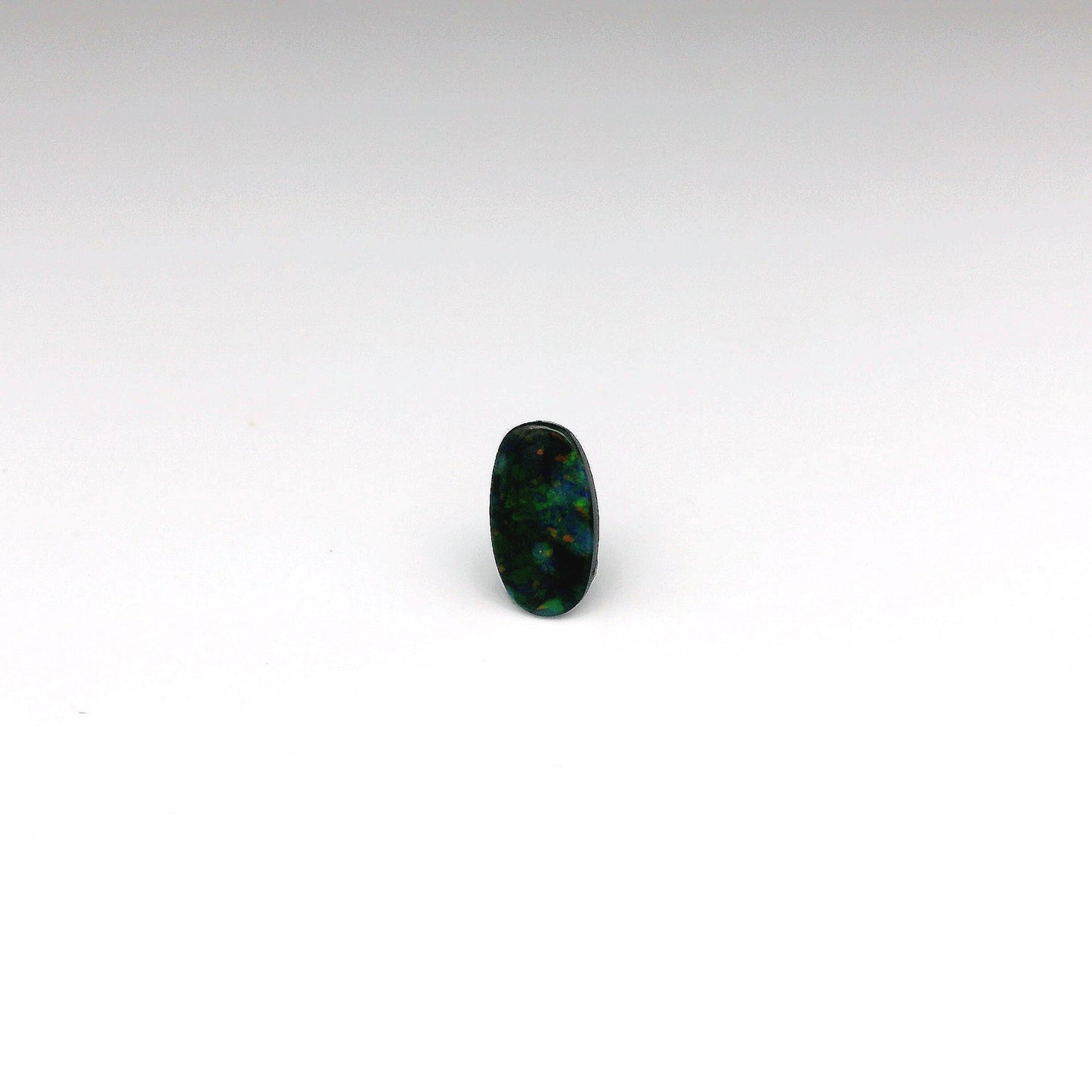 0.41ct Green, Orange Opal Gemstone Display
