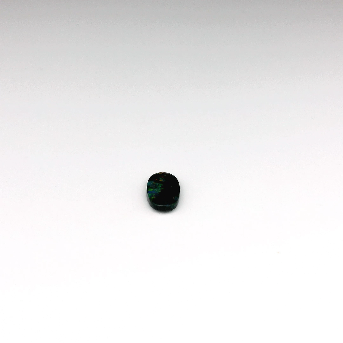 0.41ct Green, Orange Opal Gemstone Display