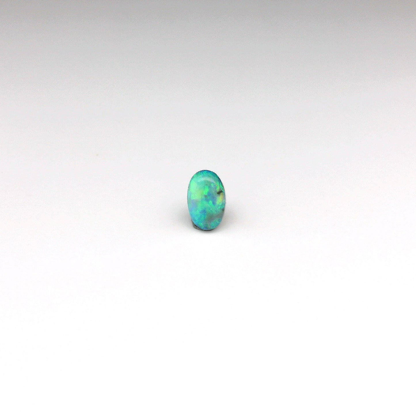 0.53ct Green, Orange Opal Gemstone