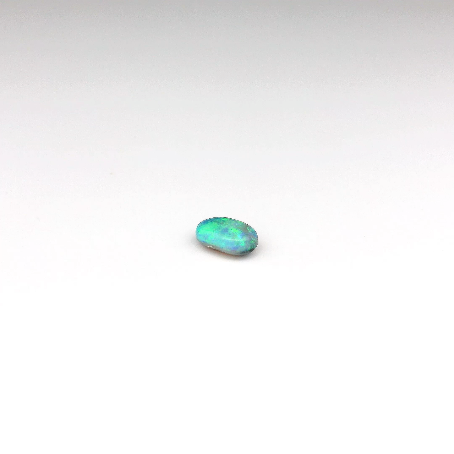 0.53ct Green, Orange Opal Gemstone