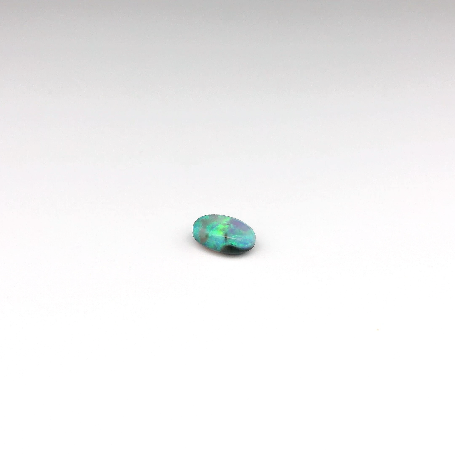 0.53ct Green, Orange Opal Gemstone