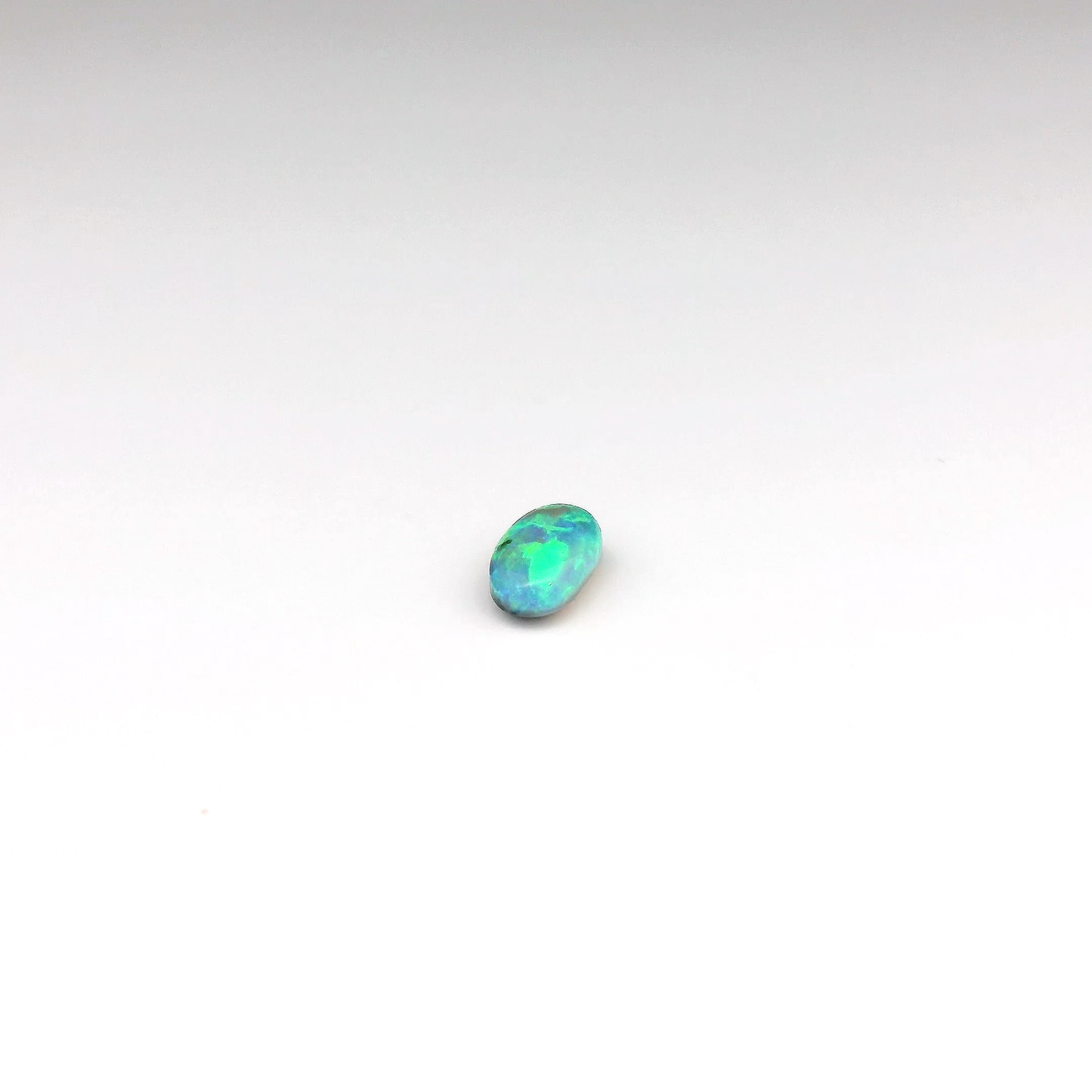 0.53ct Green, Orange Opal Gemstone