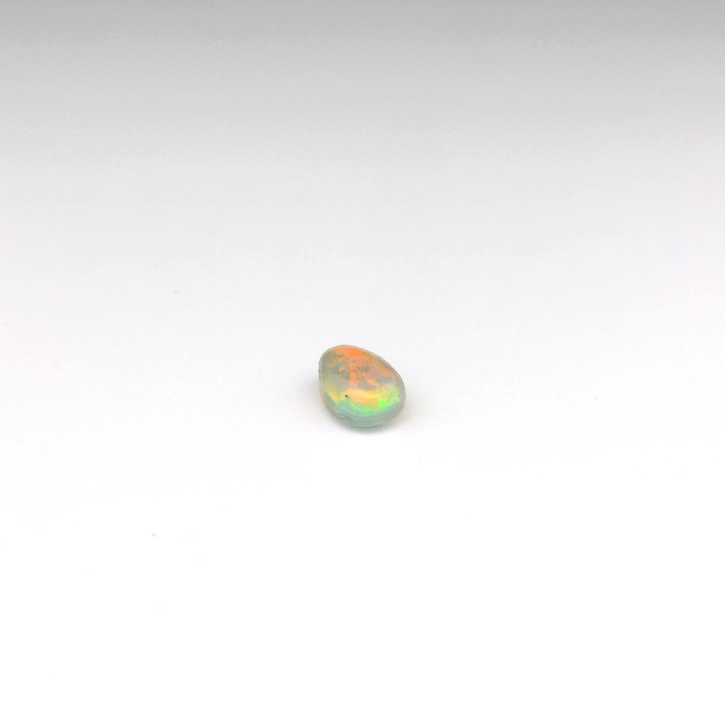 0.7ct Red, Orange Opal Gemstone