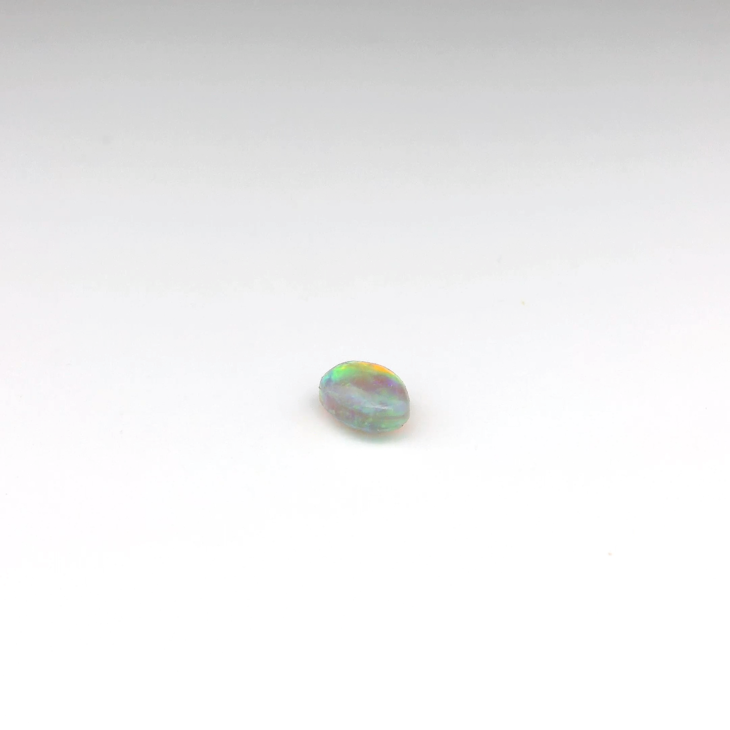 0.7ct Red, Orange Opal Gemstone