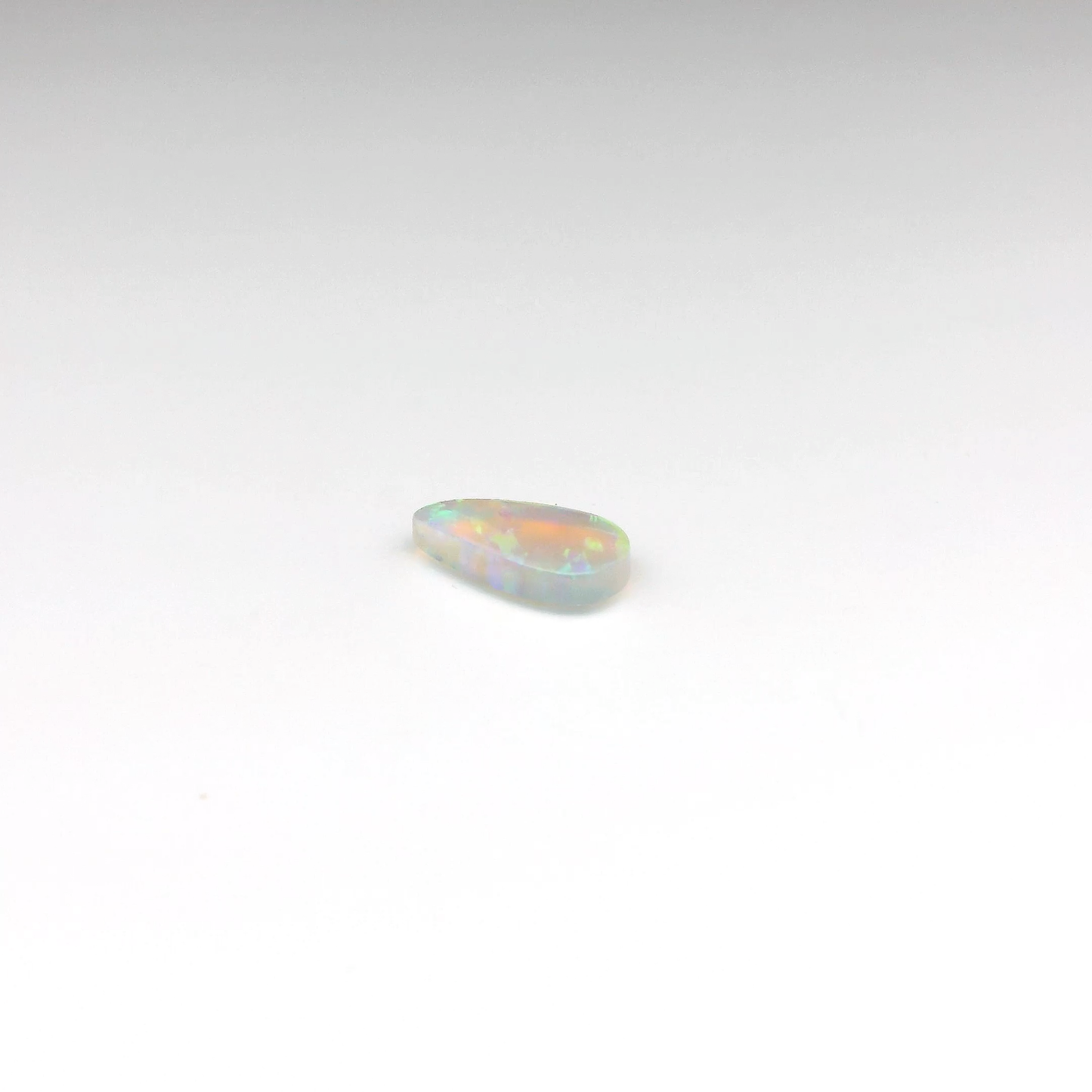 0.91ct Green, Orange Opal Gemstone