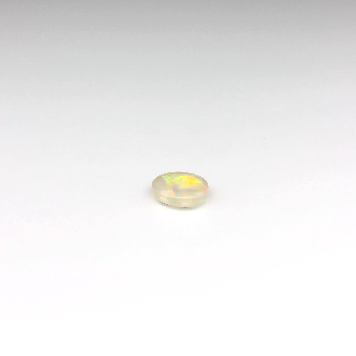 0.8ct Red, Multicolour Opal Gemstone