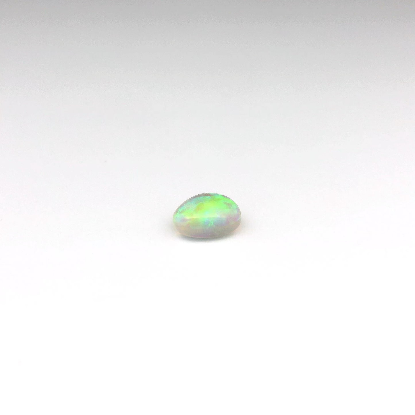 1.01ct Green, Orange Opal Gemstone