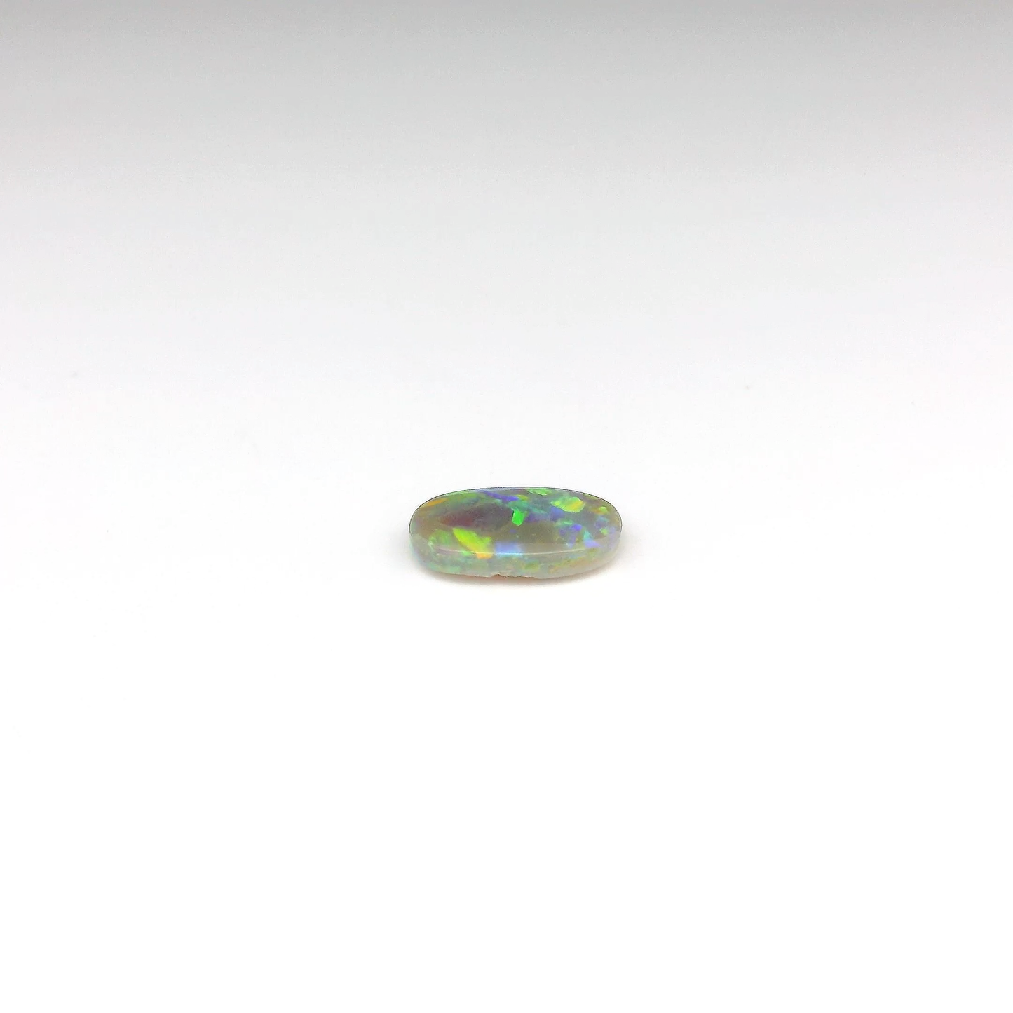 0.87ct Orange, Green Opal Gemstone