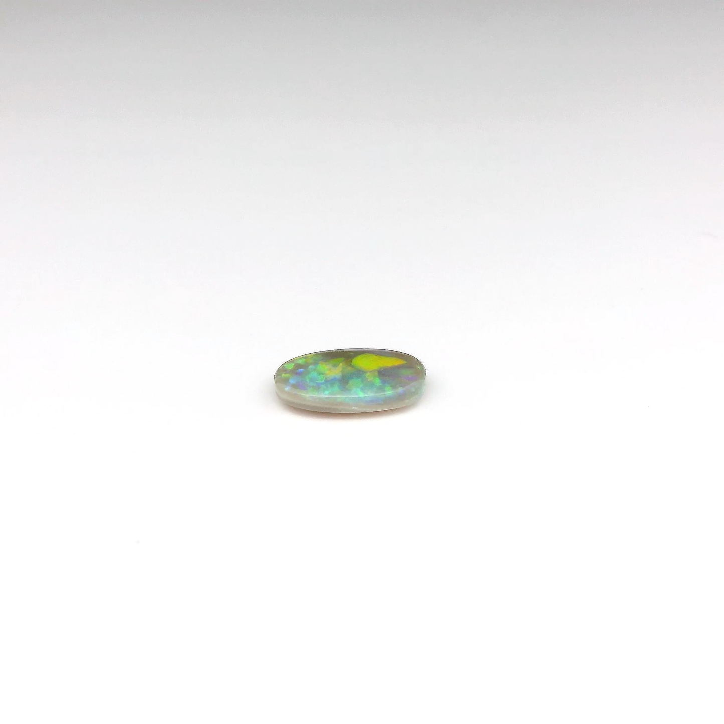0.87ct Orange, Green Opal Gemstone