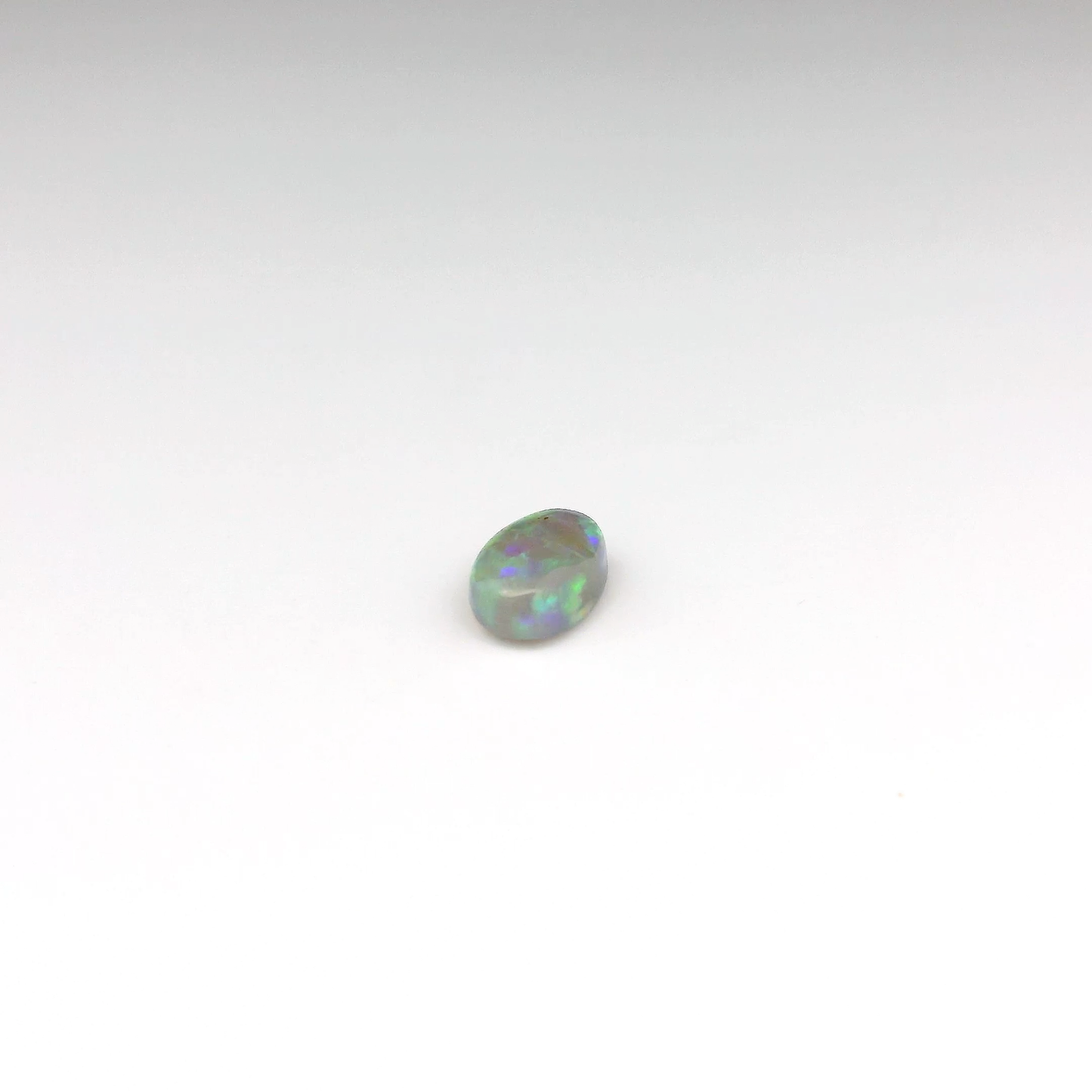0.9ct Green, Orange Opal Gemstone