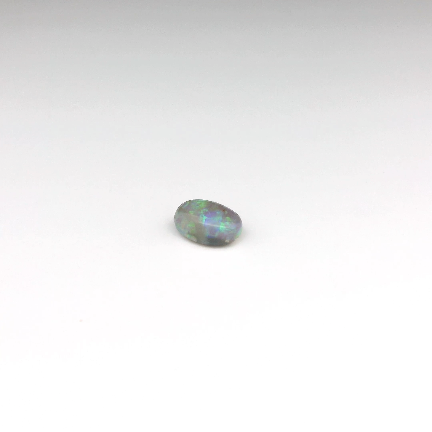 0.9ct Green, Orange Opal Gemstone