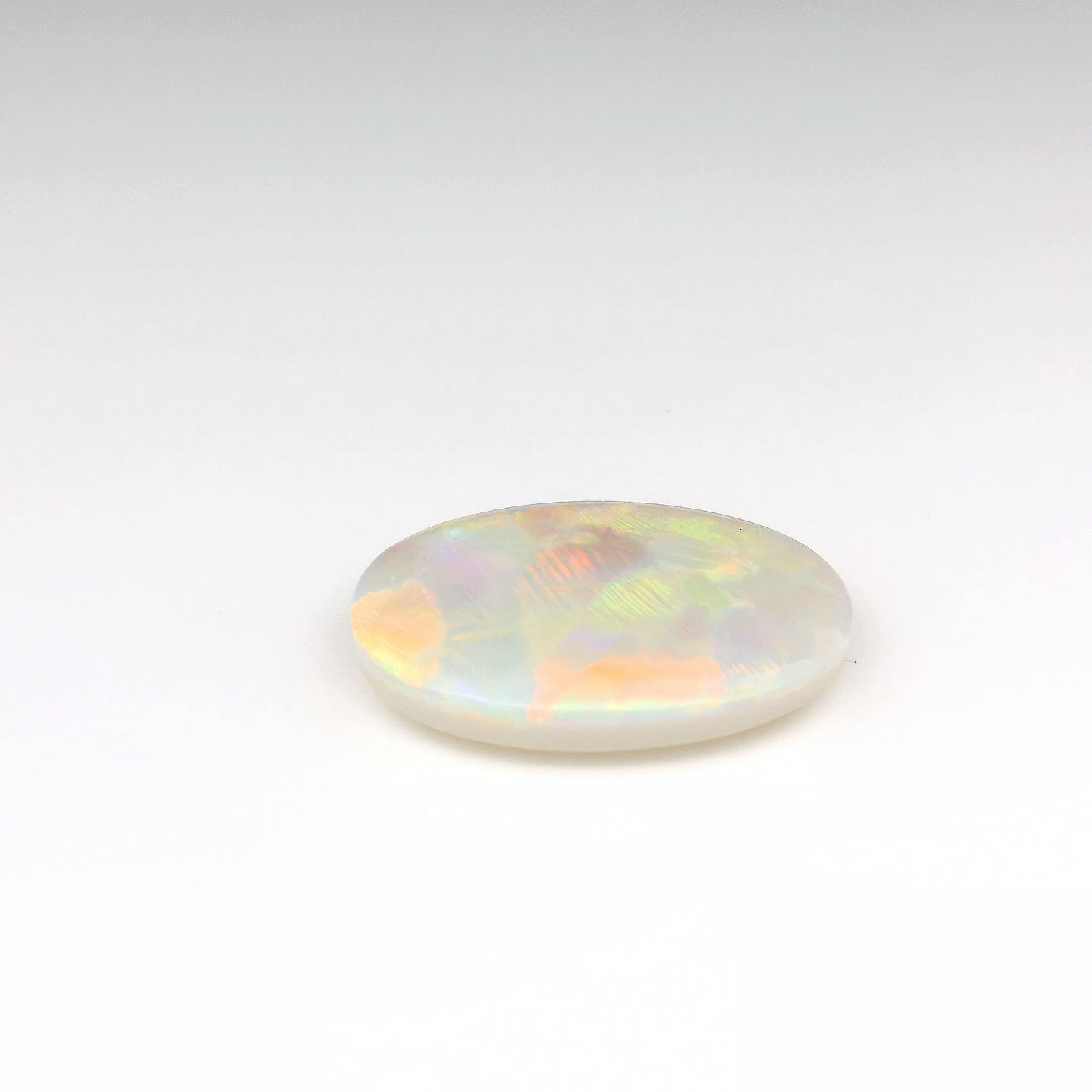 9.03ct Orange Multicolour Opal Gemstone