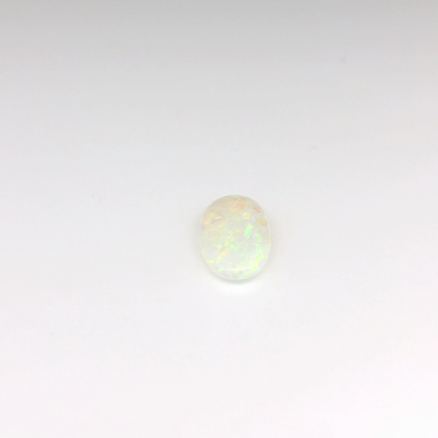 1.57ct Green, Orange Opal Gemstone