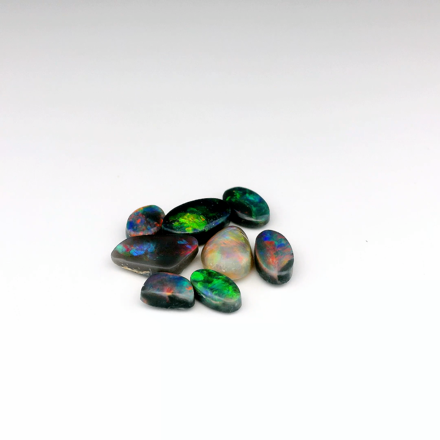 4.66ct Multicoloured 8 Gemstone Opal Group