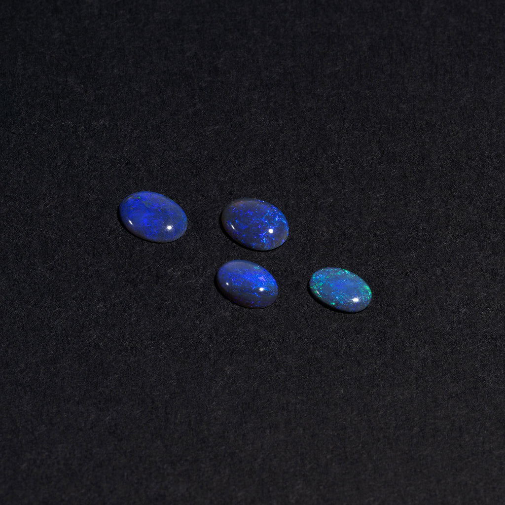 5x3 to 9x7mm Lightning Ridge Black Opal Ovals – Blue/Purple