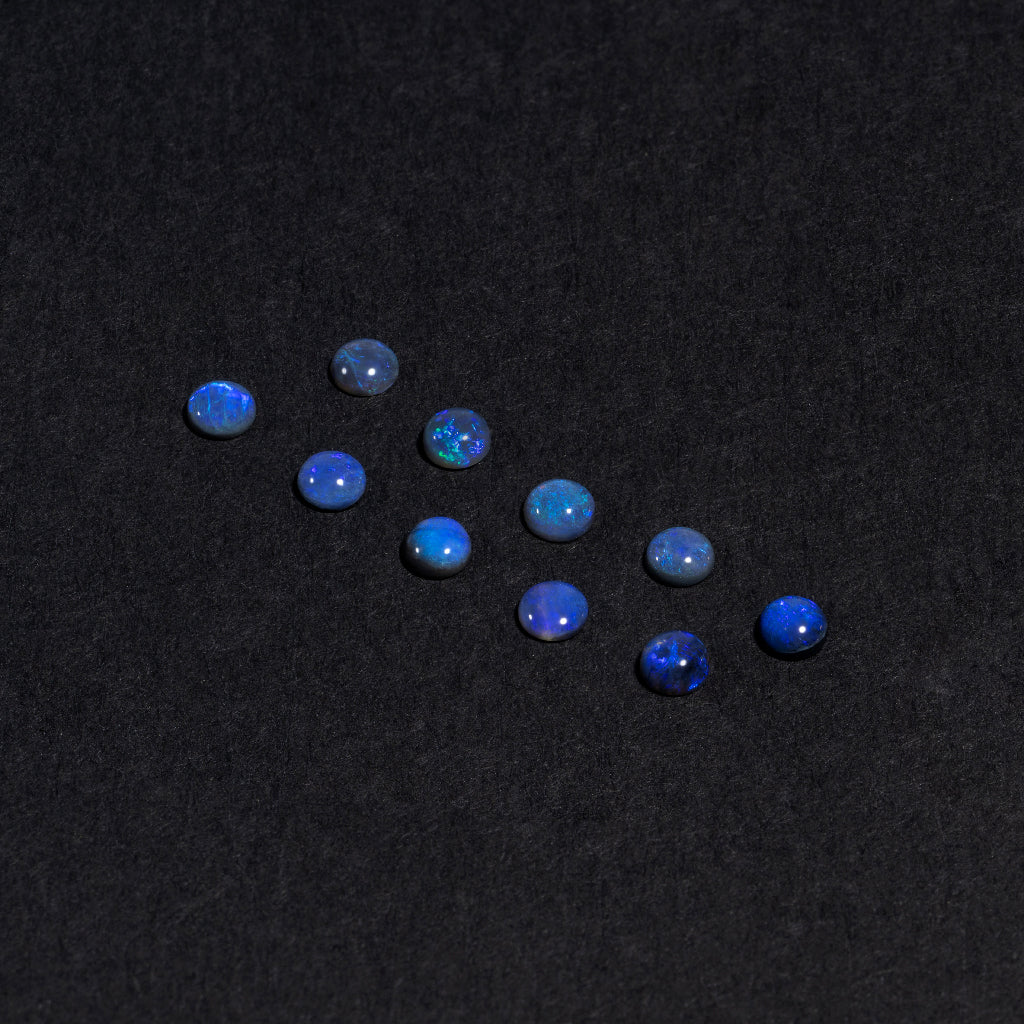 2 to 3.5mm Lightning Ridge Black Opal Rounds – Blue/Purple