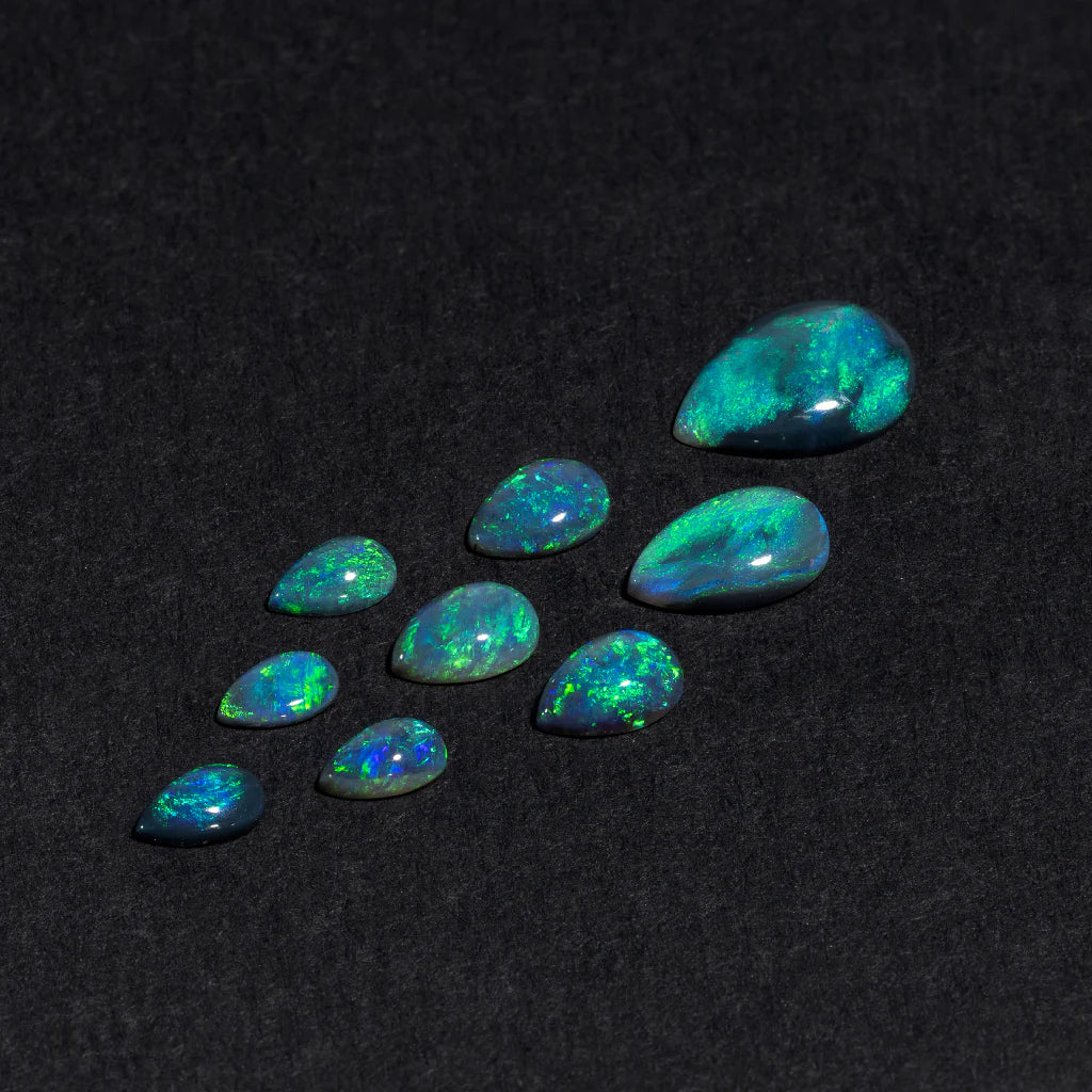 5x3 to 9x7mm Lightning Ridge Black Opal Pears – Green Play of Colour