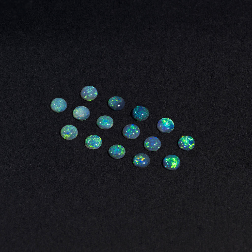2 to 3.5mm Lightning Ridge Black Opal Rounds – Green Play of Colour