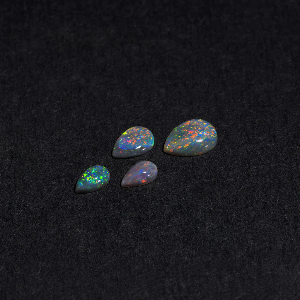 5x3 to 9x7mm Lightning Ridge Black Opal Pears – Full-Spectrum Play of Colour