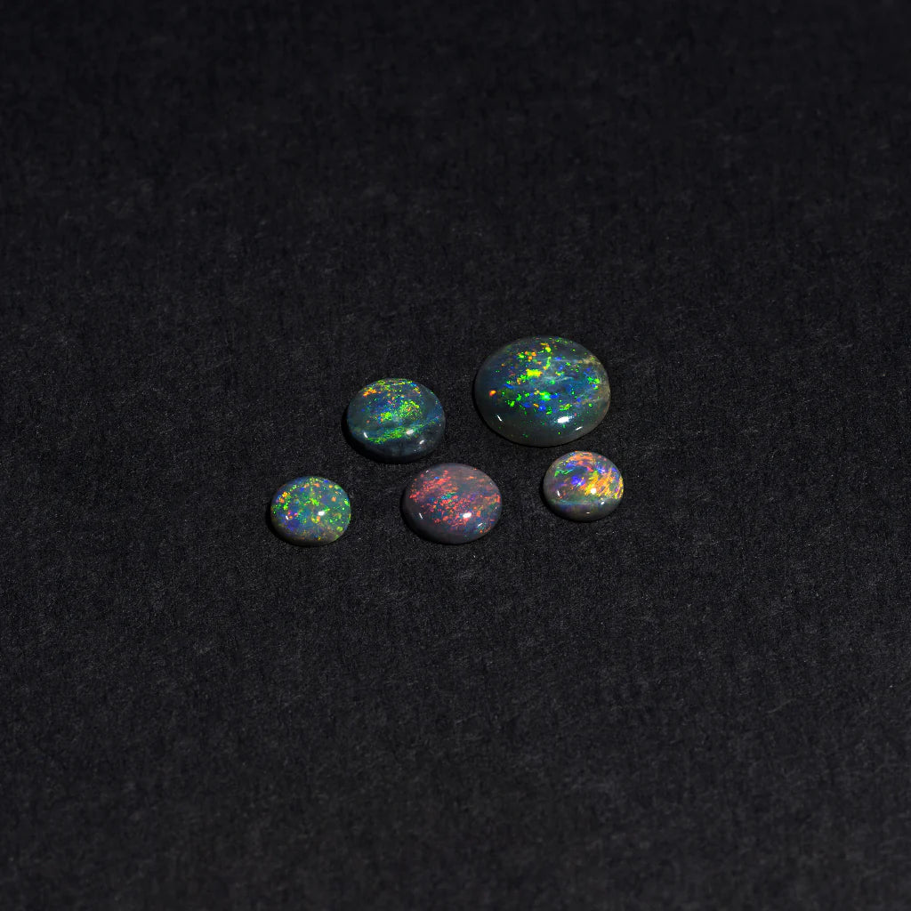 4 to 8mm Lightning Ridge Black Opal Rounds – Full-Spectrum Play of Colour