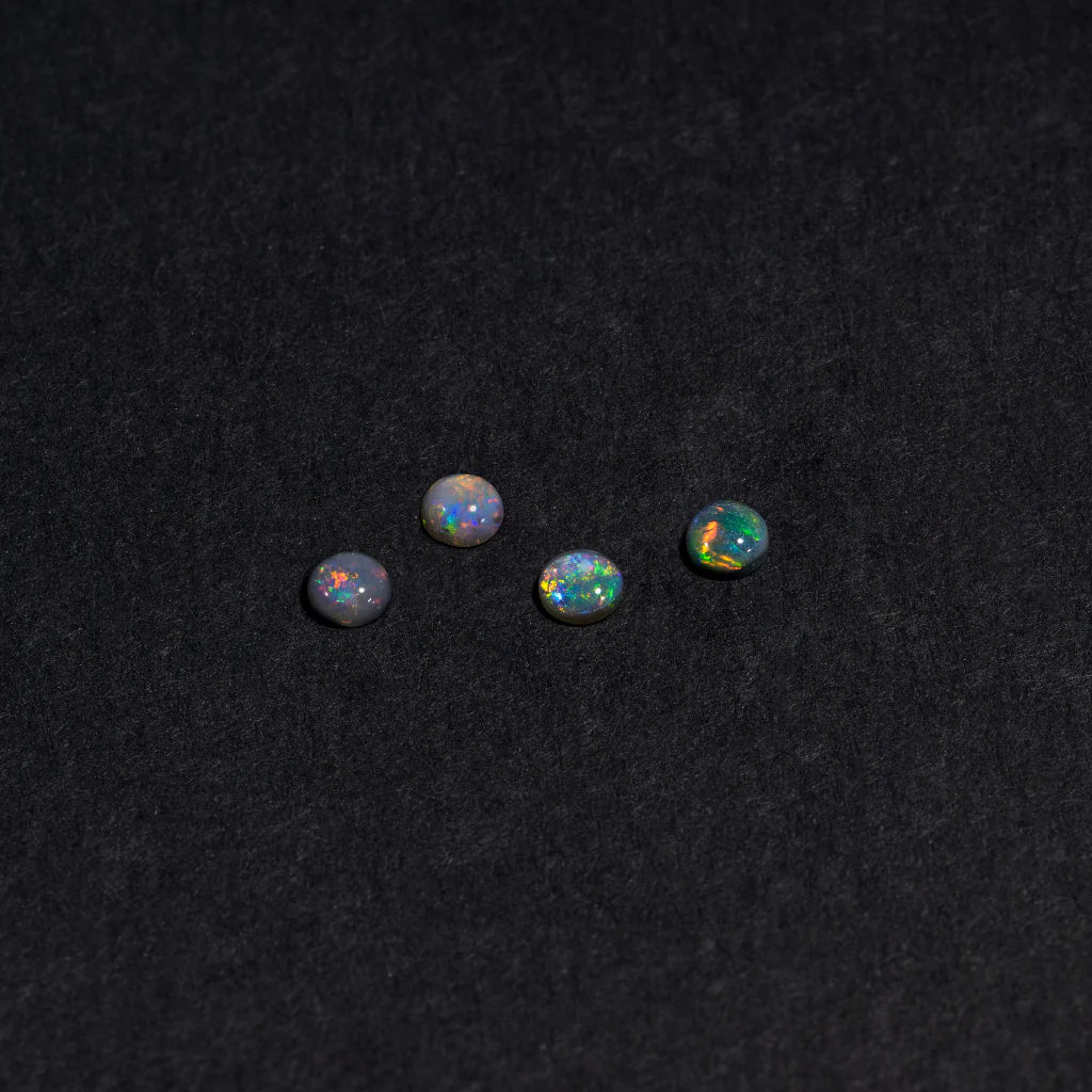 2 to 3.5mm Lightning Ridge Black Opal Rounds – Full-Spectrum Play of Colour