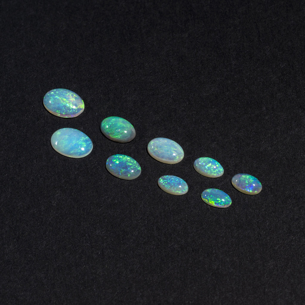 5x3 to 9x7mm Lightning Ridge Crystal Opal Ovals – Green Play of Colour