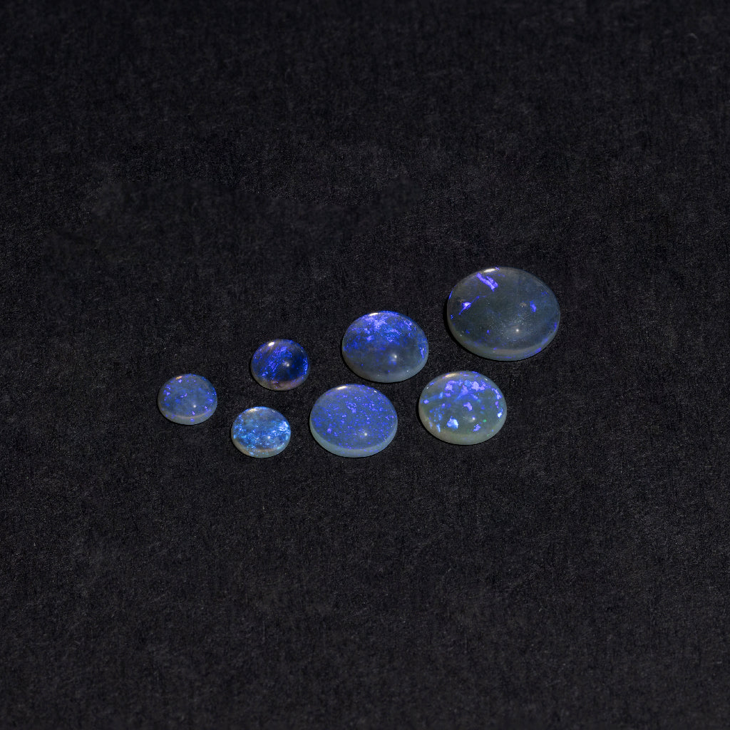 4 to 8mm Lightning Ridge Ghost Opal™ Rounds