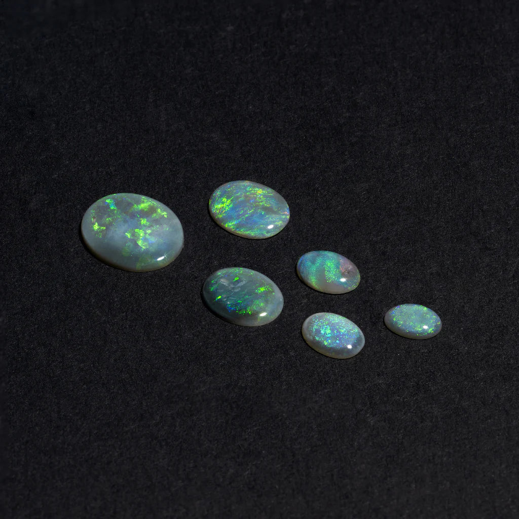5x3 to 9x7mm Lightning Ridge Semi-Black Opal Ovals – Green Play of Colour