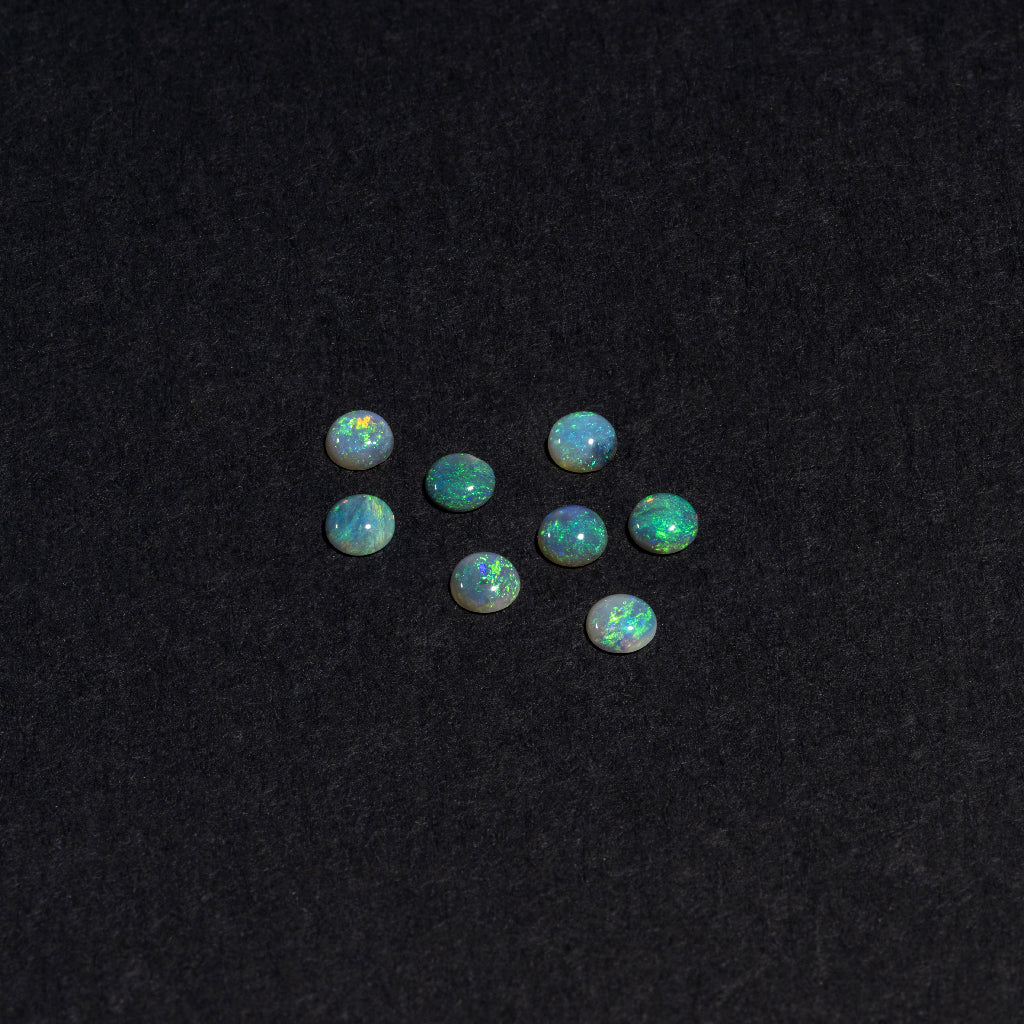 2 to 3.5mm Lightning Ridge Semi-Black Opal Rounds – Green Play of Colour