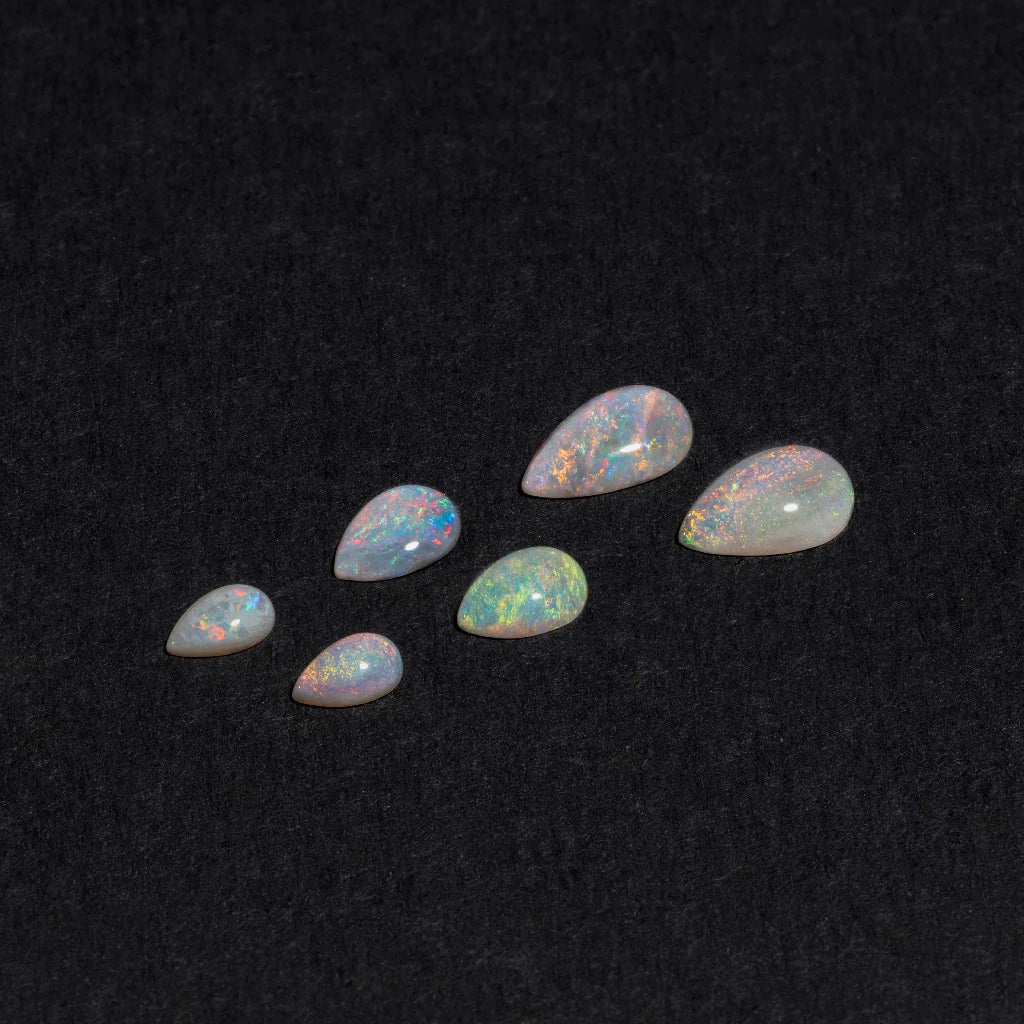 5x3 to 9x7mm Lightning Ridge White Opal Pears – Orange Play of Colour